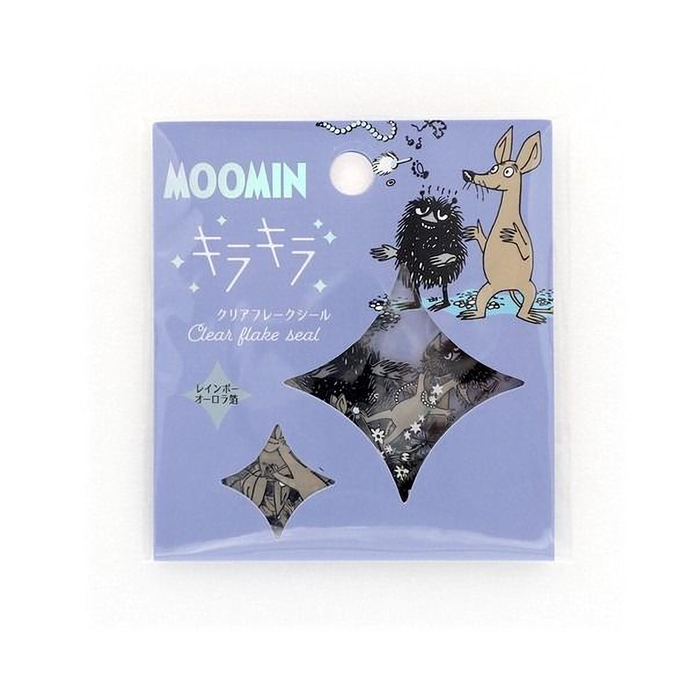 The image is a package of Moomin products, including a clearflake seal and a small square cutout.