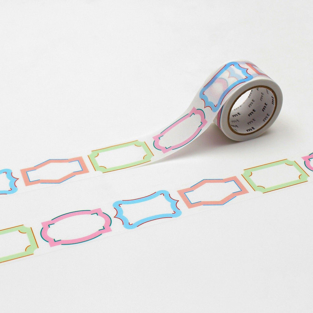 a roll of colorful patterned tape with a repeating design of various shapes and colors, including pink, blue, green, and orange.