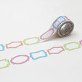 a roll of colorful patterned tape with a repeating design of various shapes and colors, including pink, blue, green, and orange.