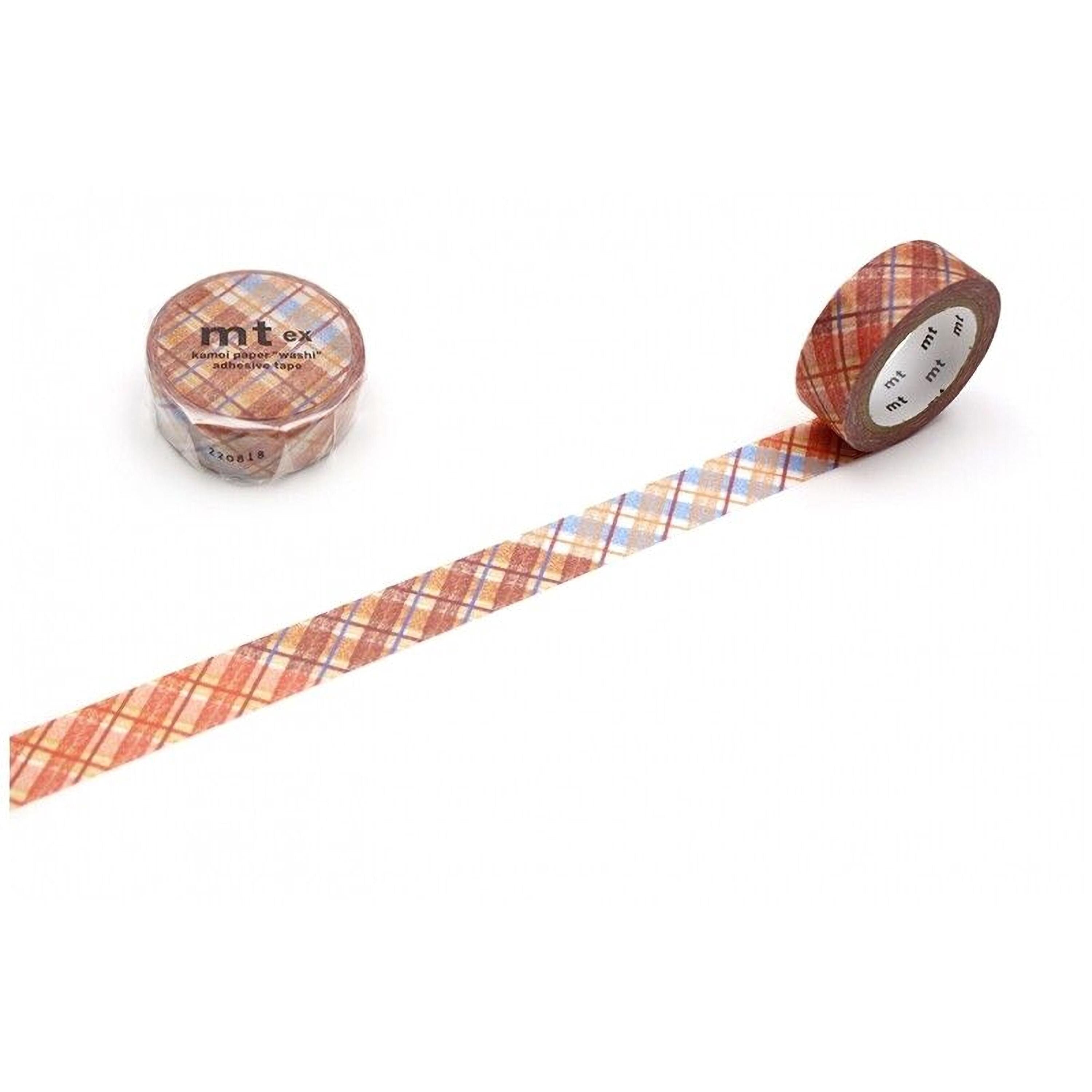 two rolls of tape with a plaid pattern, one roll is placed on the left side and the other roll is placed on the right side, both of which are lying on a white surface.