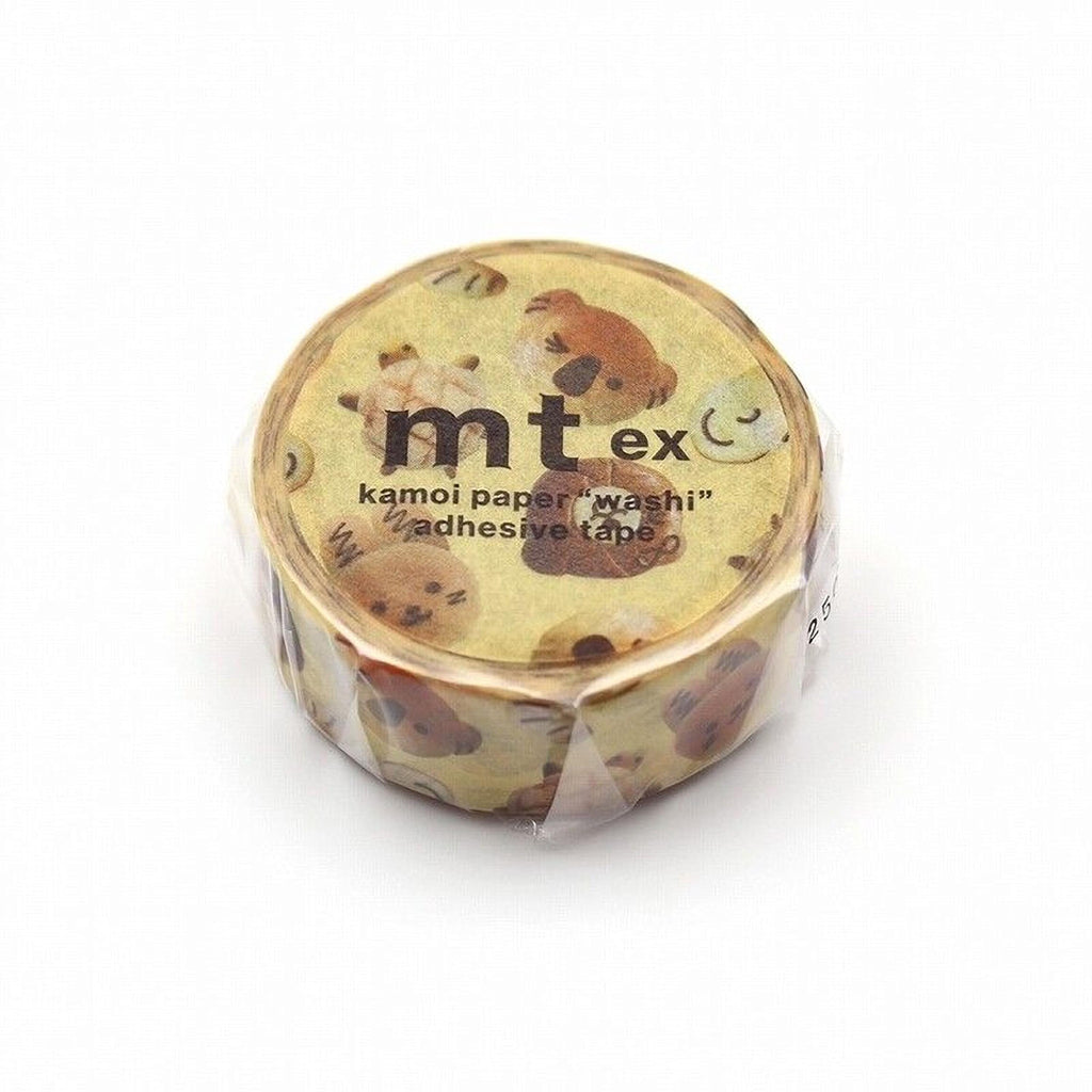 A round, yellow, and brown paper tape roll with a pattern of teddy bears on it.