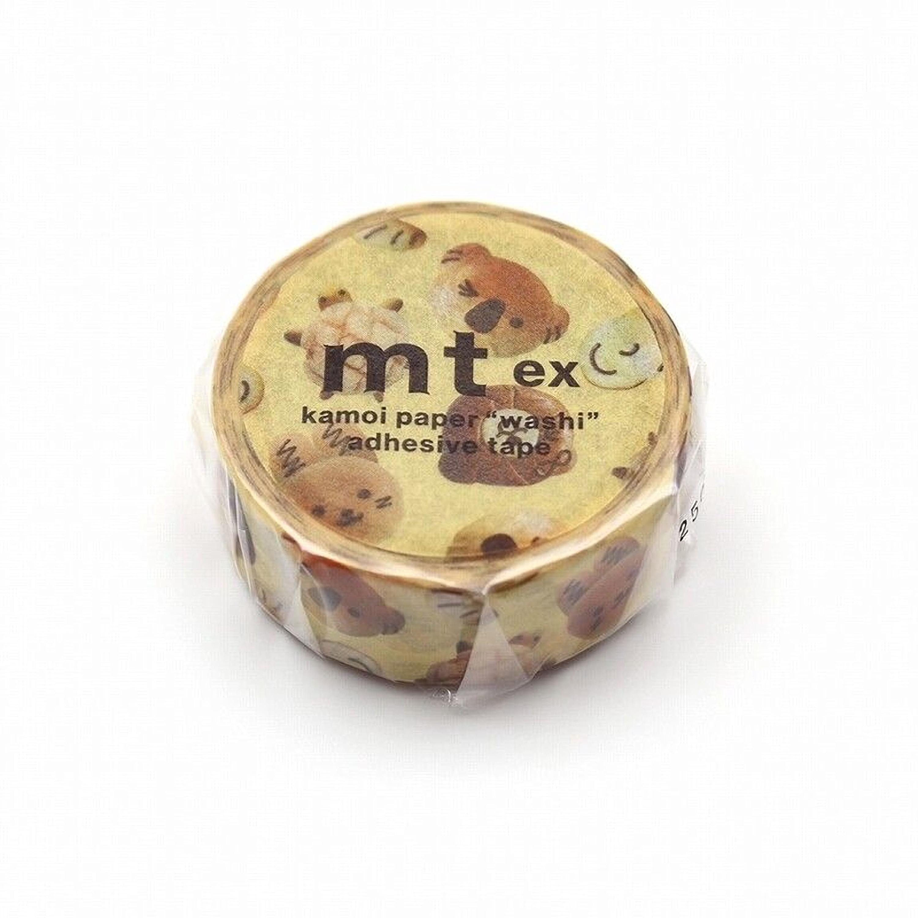A round, yellow, and brown paper tape roll with a pattern of teddy bears on it.