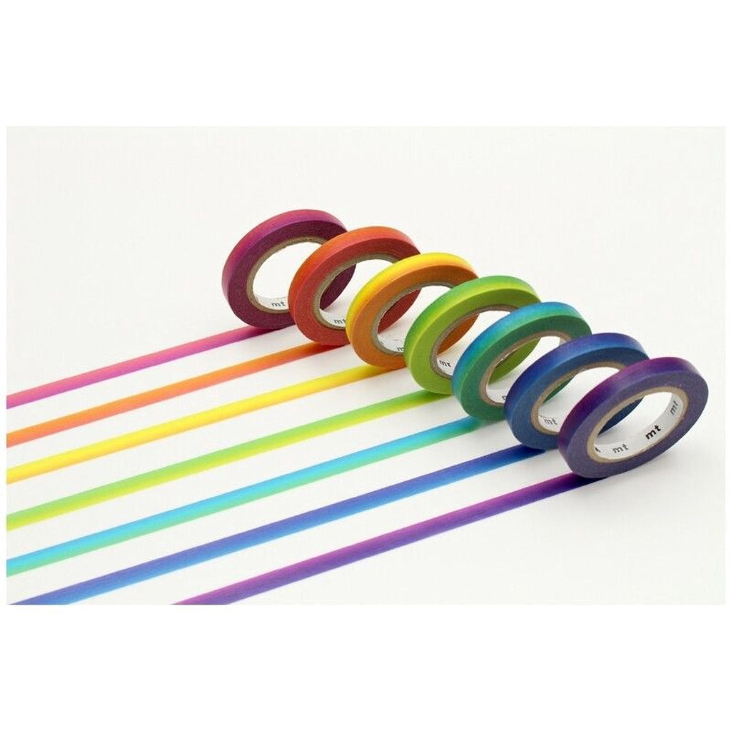 A row of colorful tape rolls arranged in a rainbow pattern against a white background.