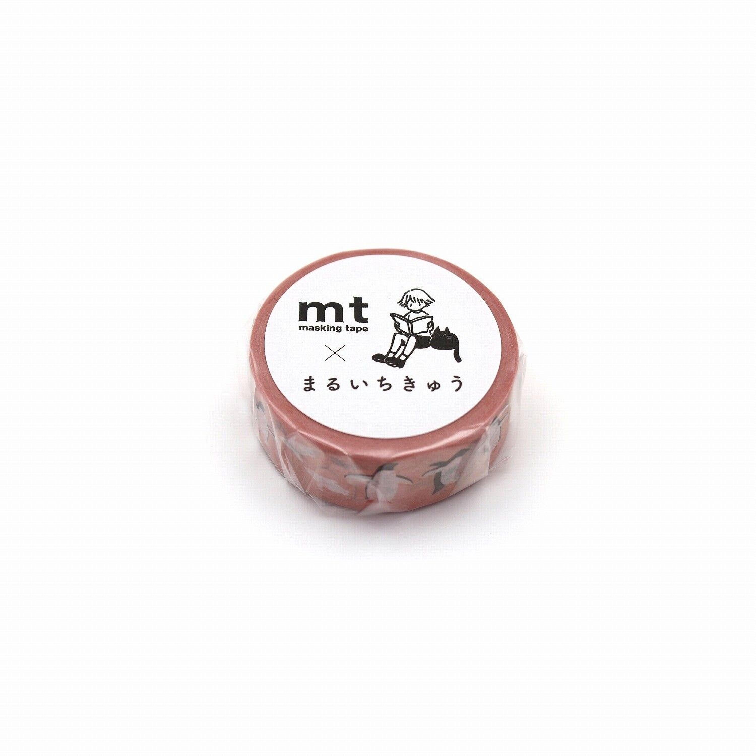 A roll of masking tape with a label that includes a cartoon character and text in a foreign language.
