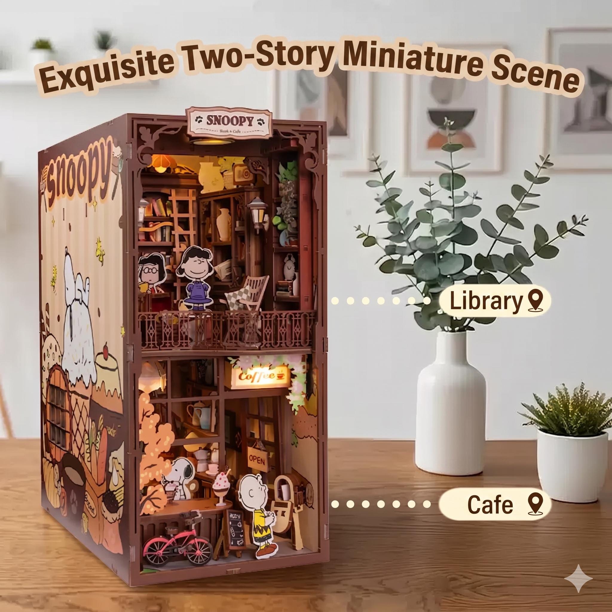 a miniature scene with a cozy library and a cafe, decorated with various elements such as a bicycle, a potted plant, and a vase.