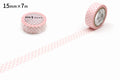 two rolls of pink and white polka dot tape on a white background.