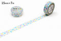 two rolls of patterned tape with a polka dot design, one roll placed on top of the other.