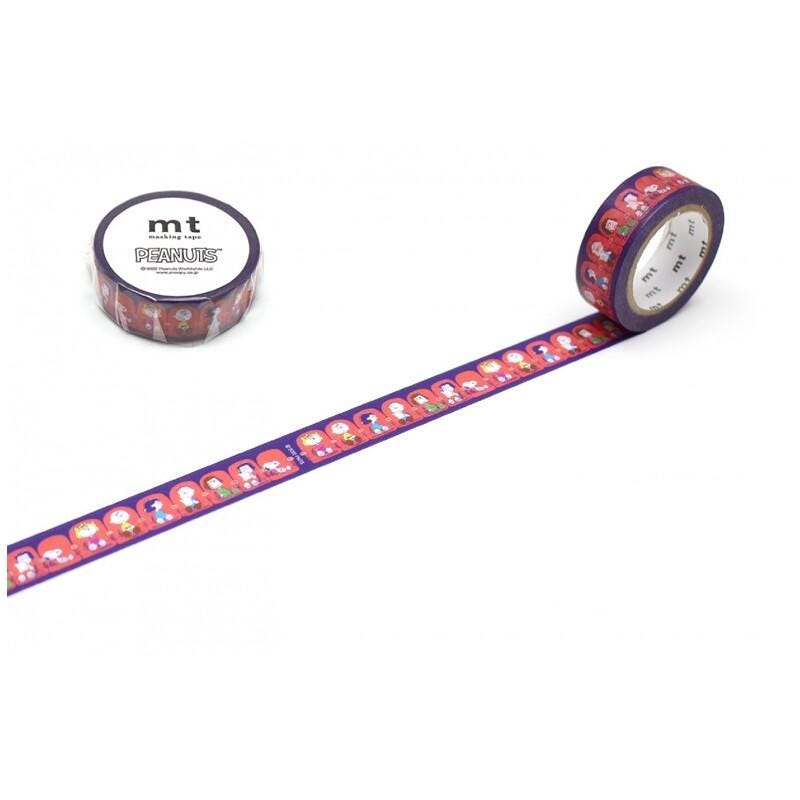 a roll of purple and red patterned tape with a repeating design of cartoon-like figures, and a round container of the same tape.