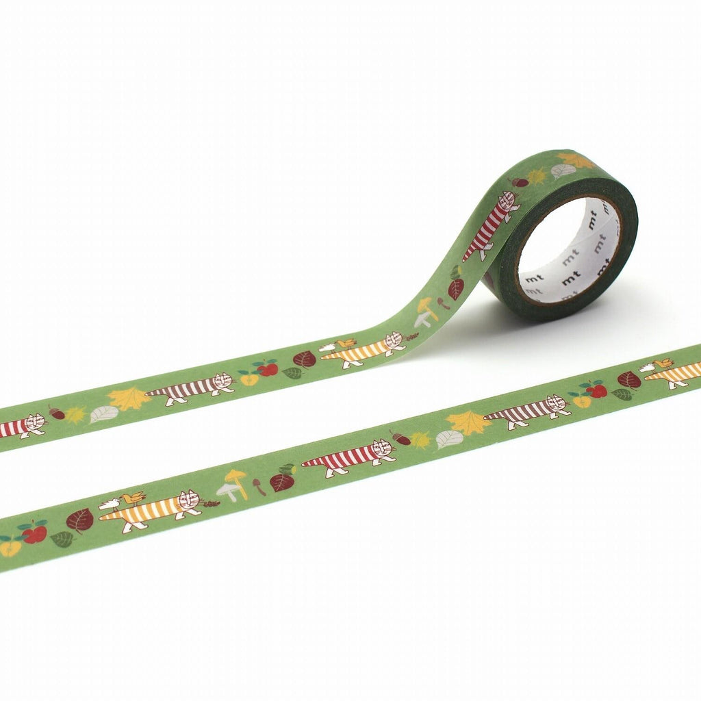a roll of green tape with a pattern of various animals, including zebras, birds, and other wildlife, printed on it.