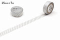 two rolls of gray and white polka dot tape on a white background.
