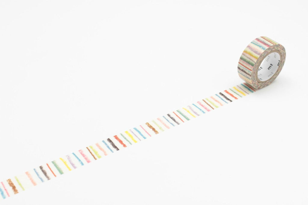 A roll of multicolored washi tape is lying on a white surface, with a colorful striped pattern visible on the tape.