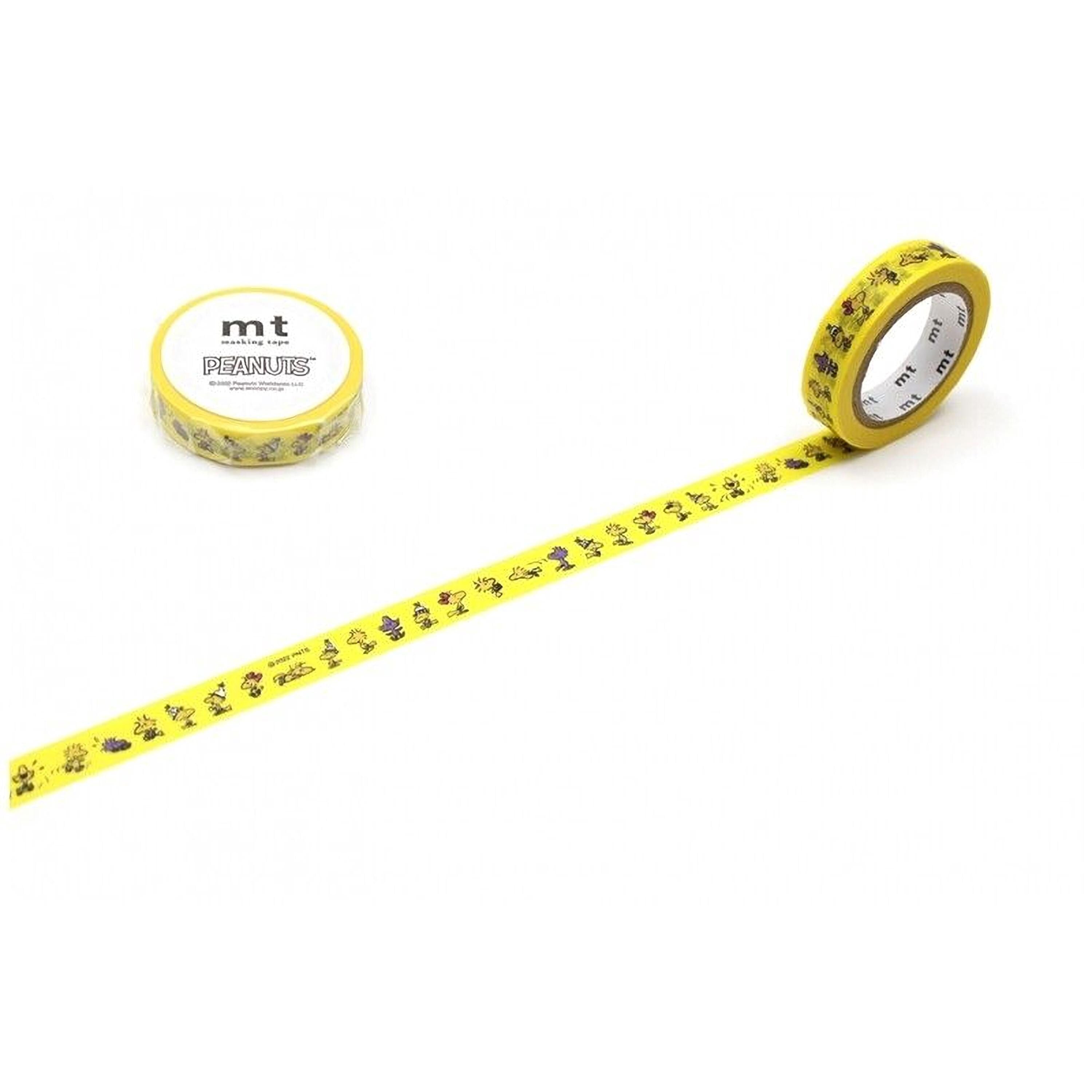 a yellow and black patterned tape roll and a round yellow lid with the text "MT PENNY" printed on it, both placed on a white background.