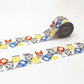 a roll of clear packing tape with a repeating pattern of various symbols and text, including the words "FRAGILE", "HANDLE WITH CARE", and "KEEP UP".