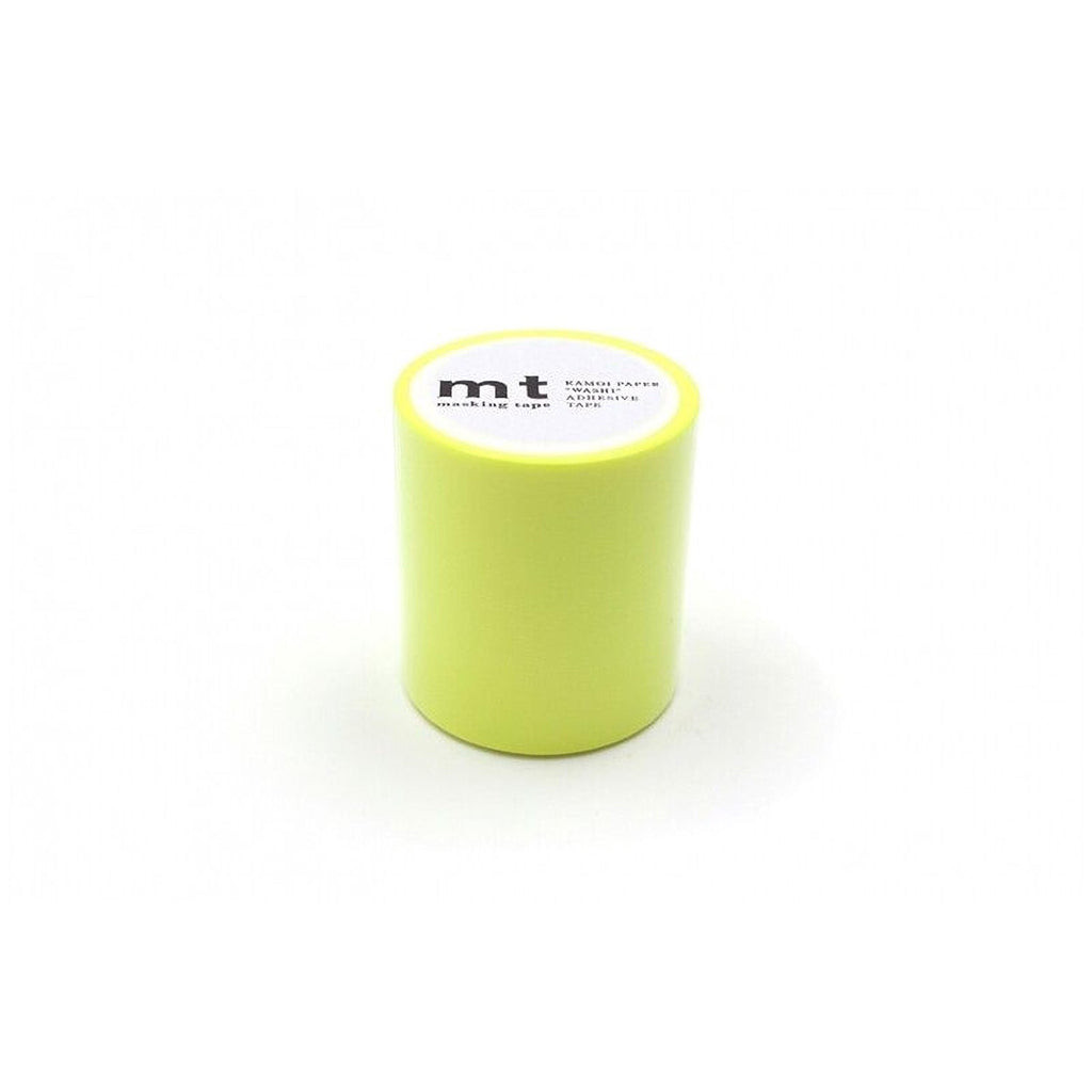A bright yellow cylindrical object with a white label on it, placed against a white background.