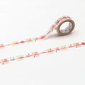 a roll of transparent tape with a repeating pattern of red bows on a white background.