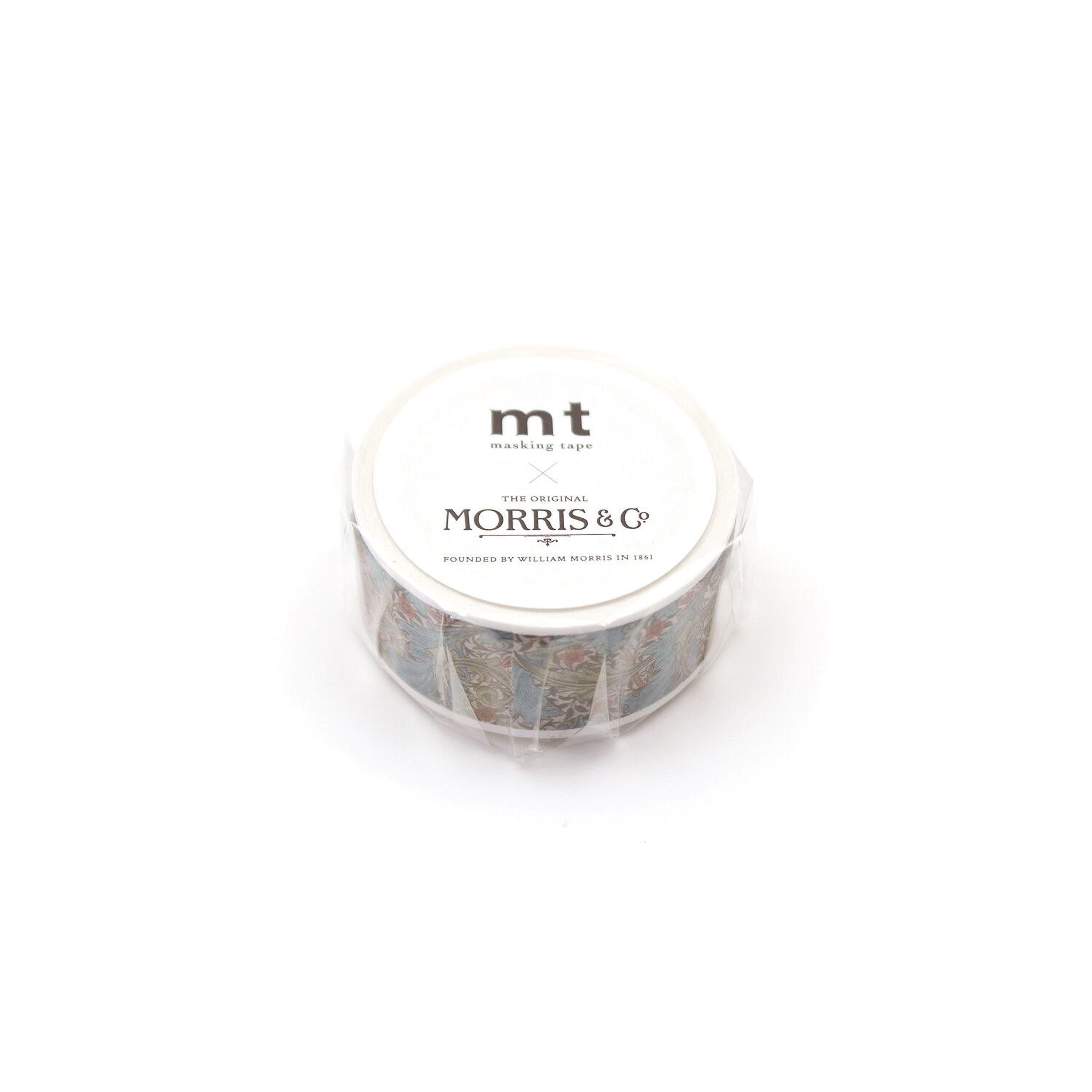 A cylindrical container with a white label, featuring the text "mt" and "MORRIS & CO" printed on it.