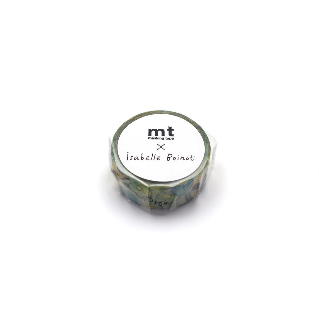 A round object with a label that reads "mt masking tape Isabelle Boinot" and a number "1068" on it.