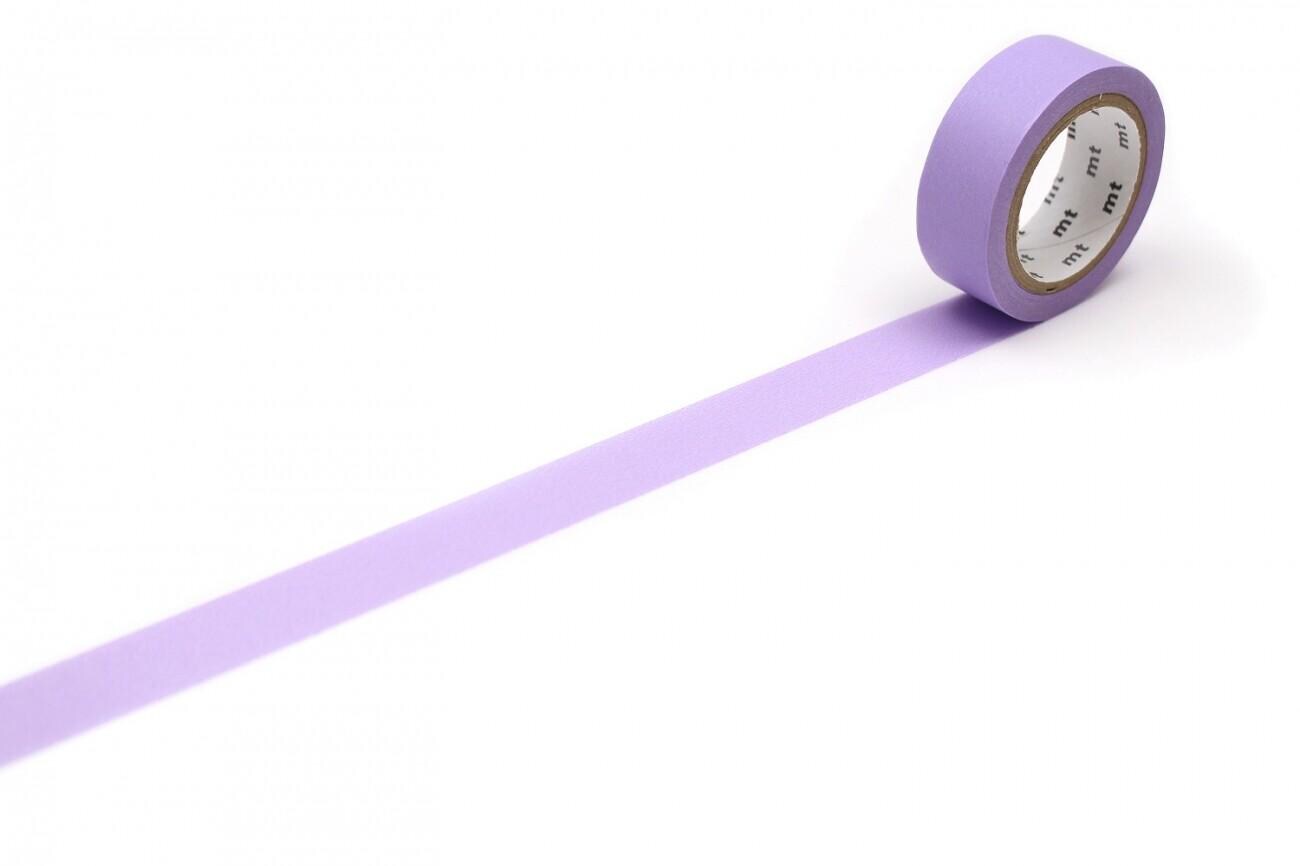 A roll of purple washi tape is lying on a white surface, with a single strip of tape extending from the top of the roll to the bottom.
