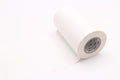 A roll of white paper tape is shown against a plain white background.
