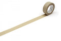 A roll of beige tape with a white label is lying on a white surface, with the tape partially unrolling and extending across the image.