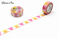 two rolls of pink and yellow patterned tape on a white background.