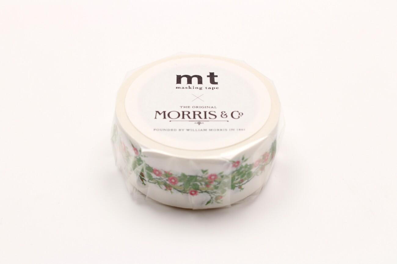 A roll of Morris & Co. masking tape with a floral pattern.