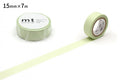 a roll of green masking tape and a single roll of the same tape, both lying on a white background.