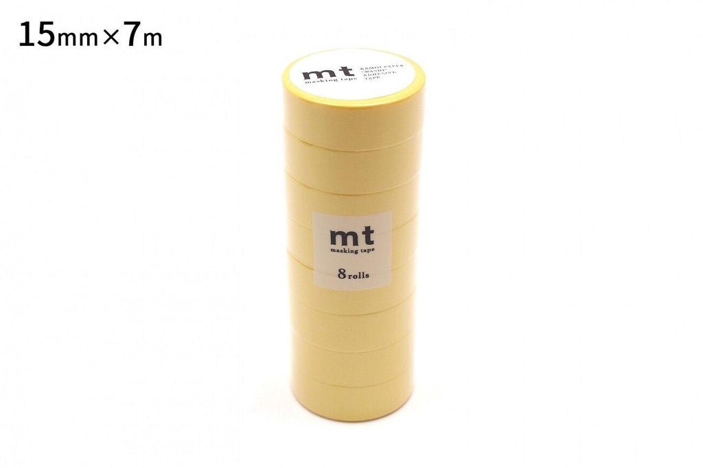 A stack of yellow tape rolls with the text "mt" and "marking tape" printed on them.