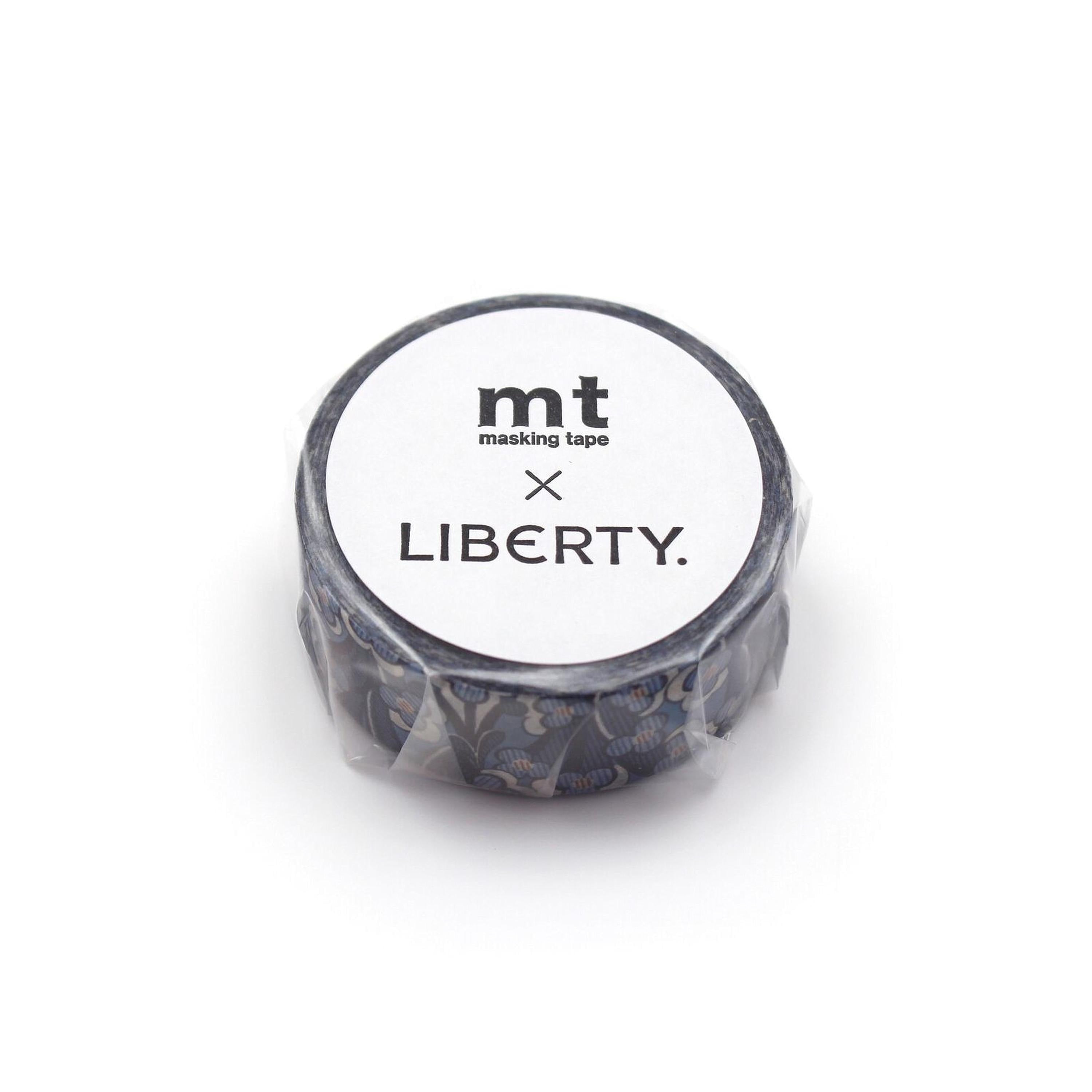 A round, black and white masking tape roll with the text "mt masking tape LIBERTY." printed on it.