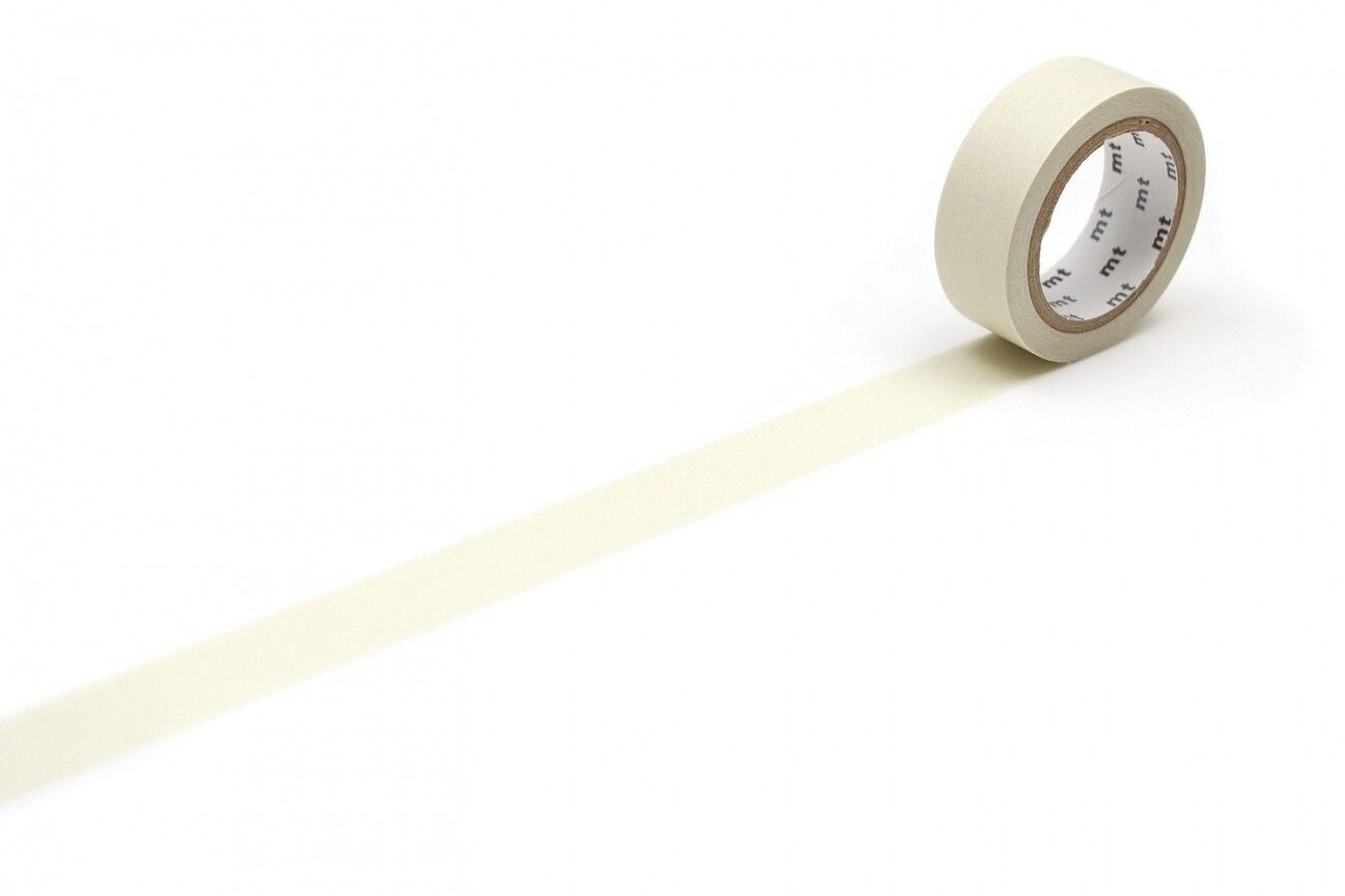 A roll of white tape with a black label is lying on a white surface, with a long white line extending from the tape.