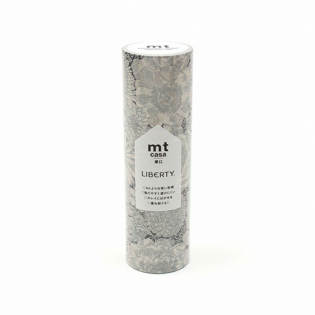 A cylindrical container with a floral pattern and text on it.