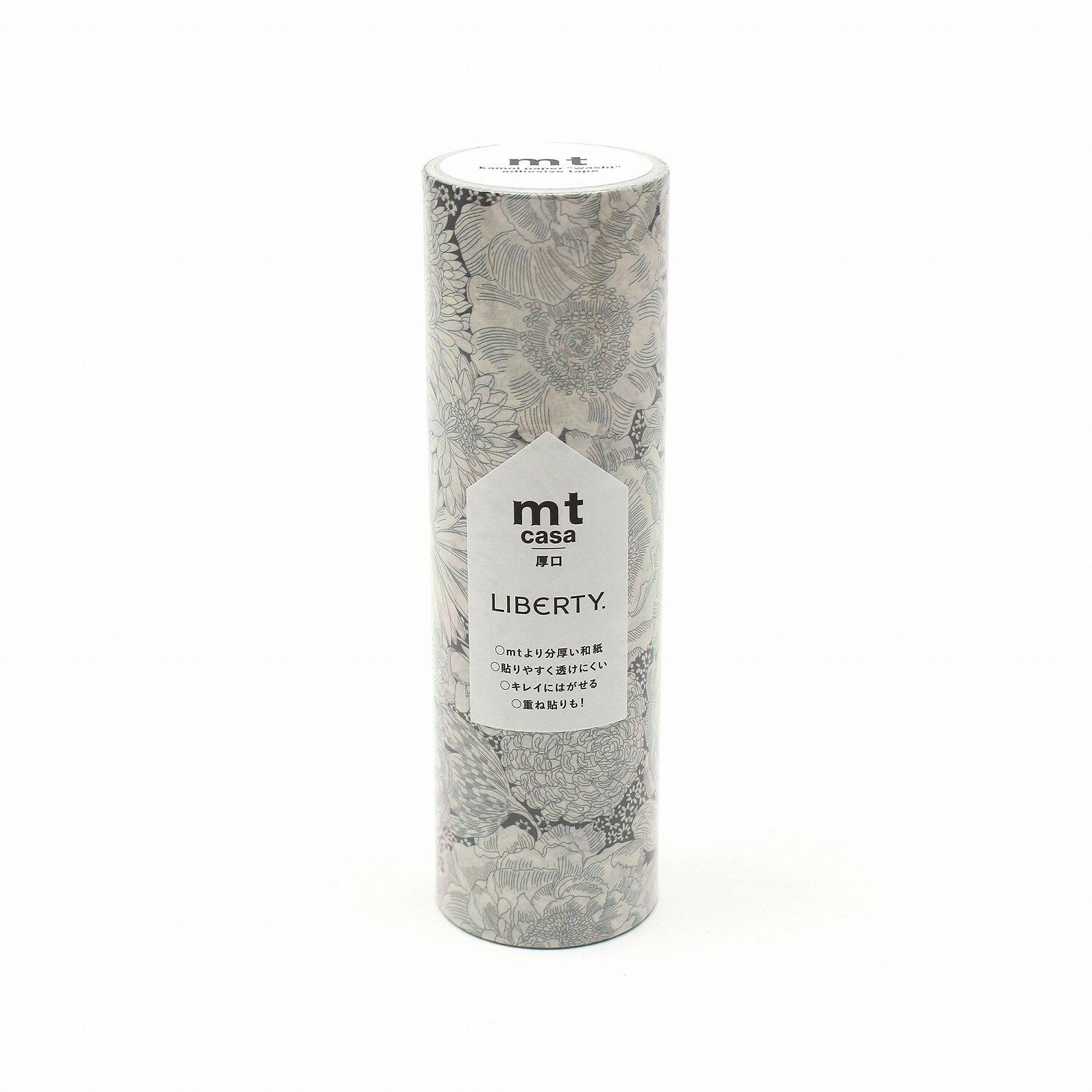 A cylindrical container with a floral pattern and text on it.