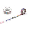 a roll of colorful patterned tape and a single roll of tape on a white background.