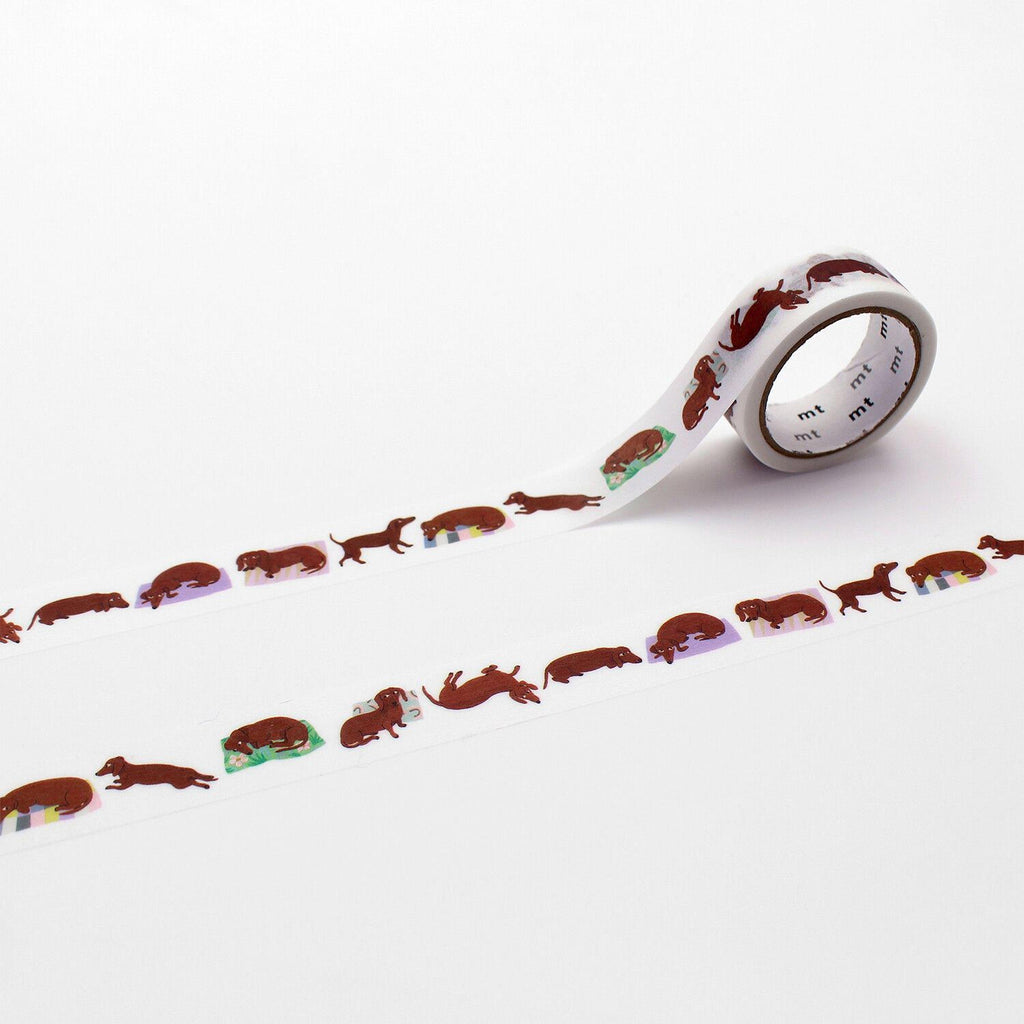 a roll of tape with a repeating pattern of brown dogs on a white background.