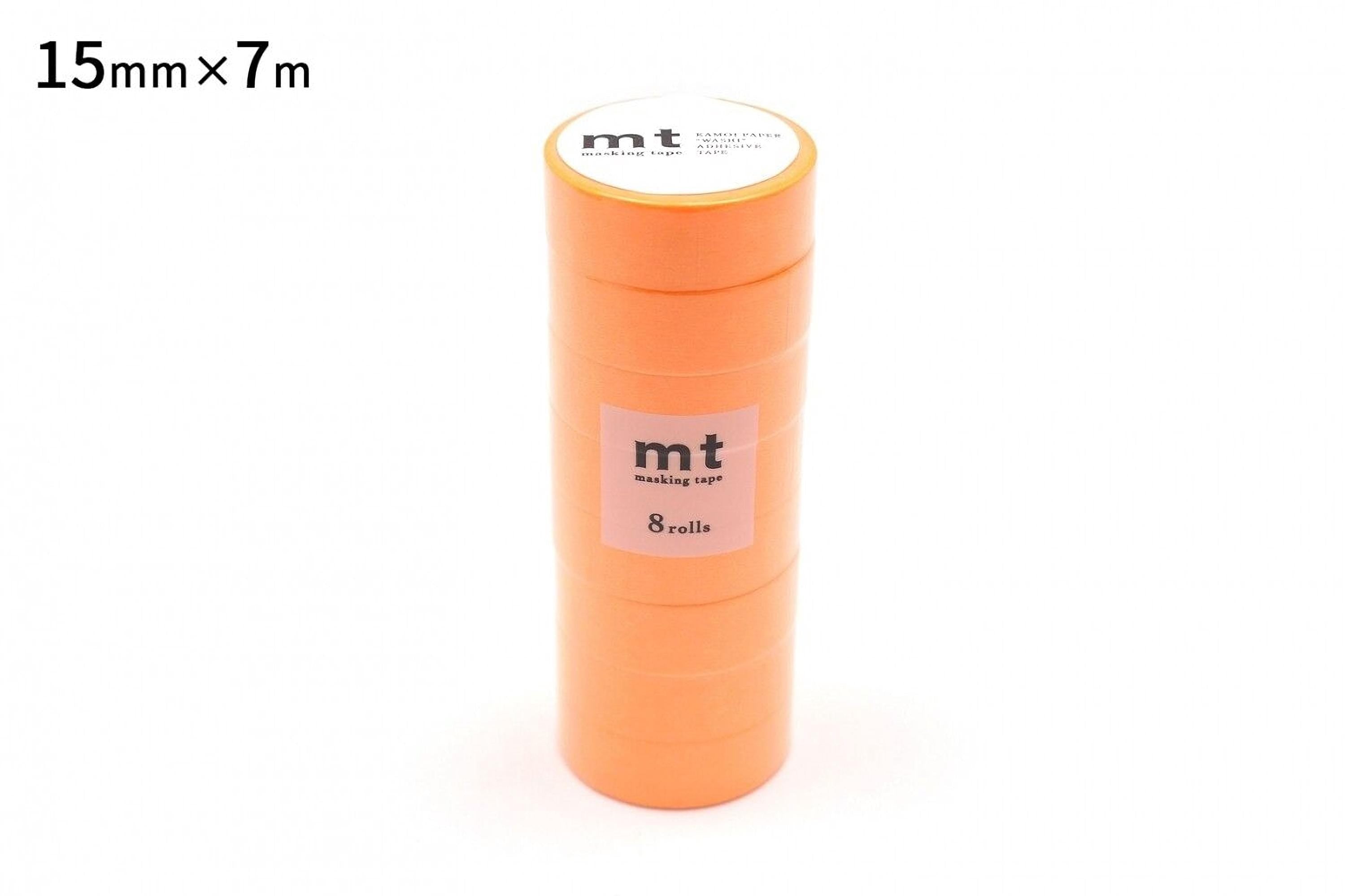 A stack of orange tape rolls with the brand name mt' printed on them.