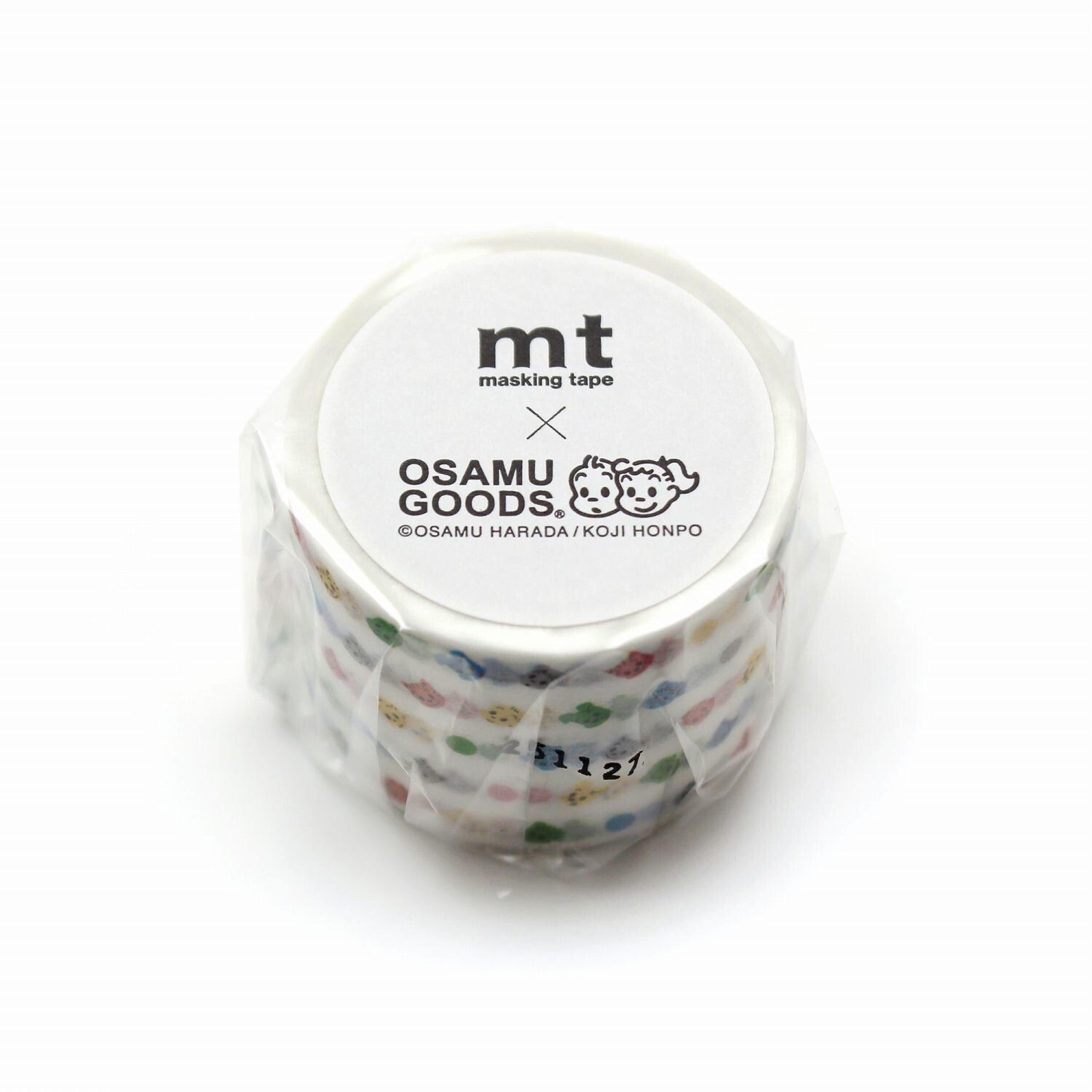 A white cylindrical container with a label that reads "mt masking tape OSAMU GOODS ©OSAMU HARADA/KJI HONPO".