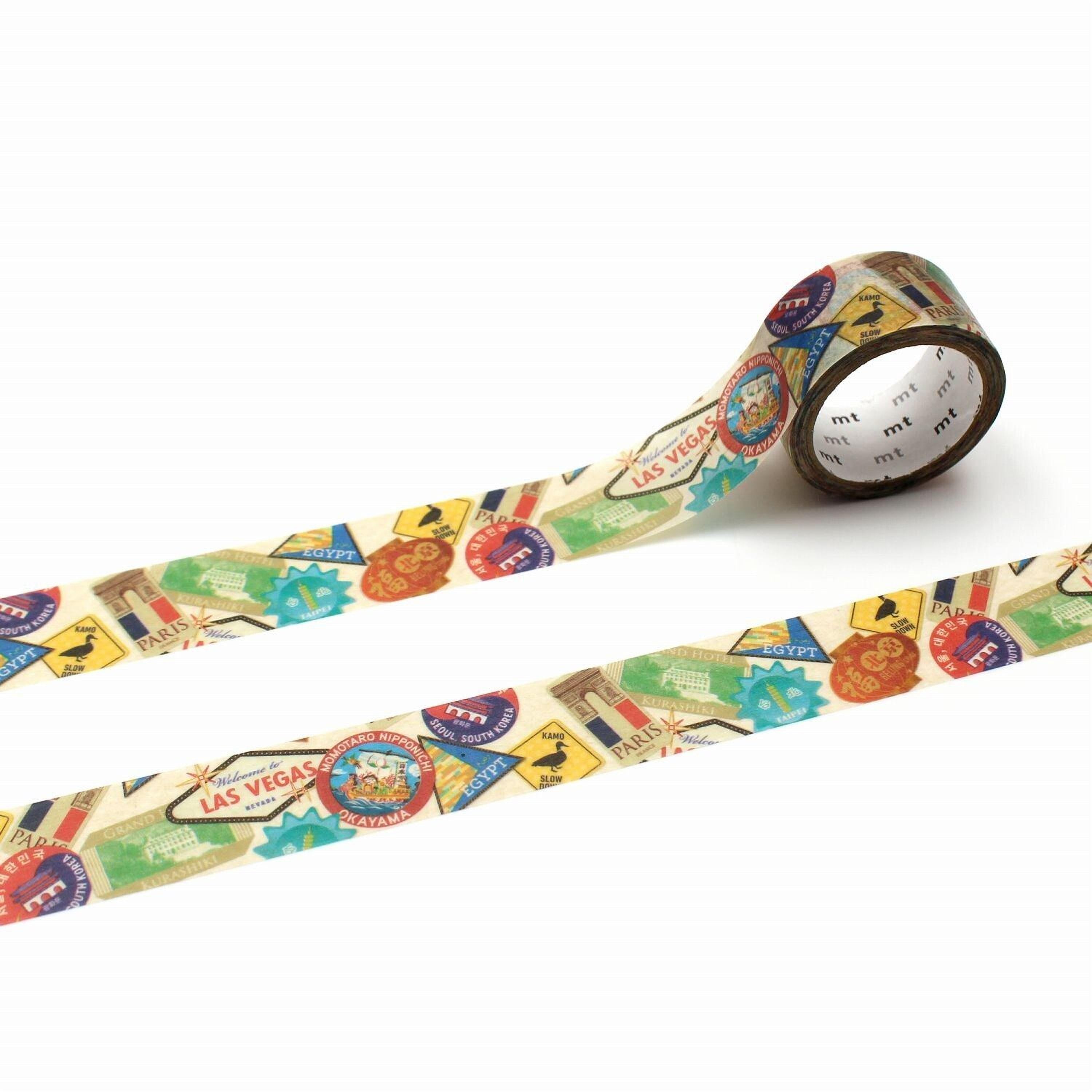 a roll of colorful tape with various travel-related stickers and illustrations on it.