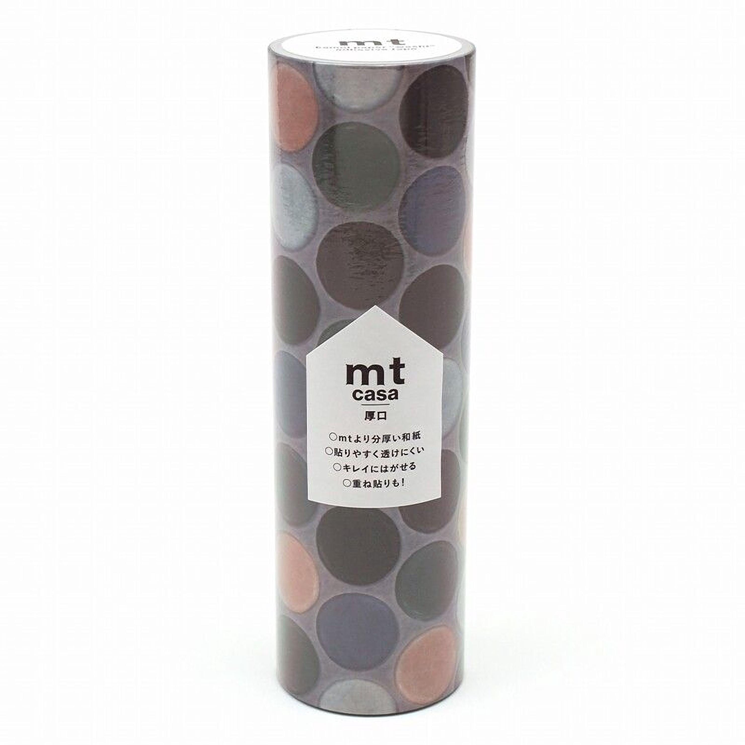 a cylindrical container with a pattern of circles on it, and there is a label with text on it.