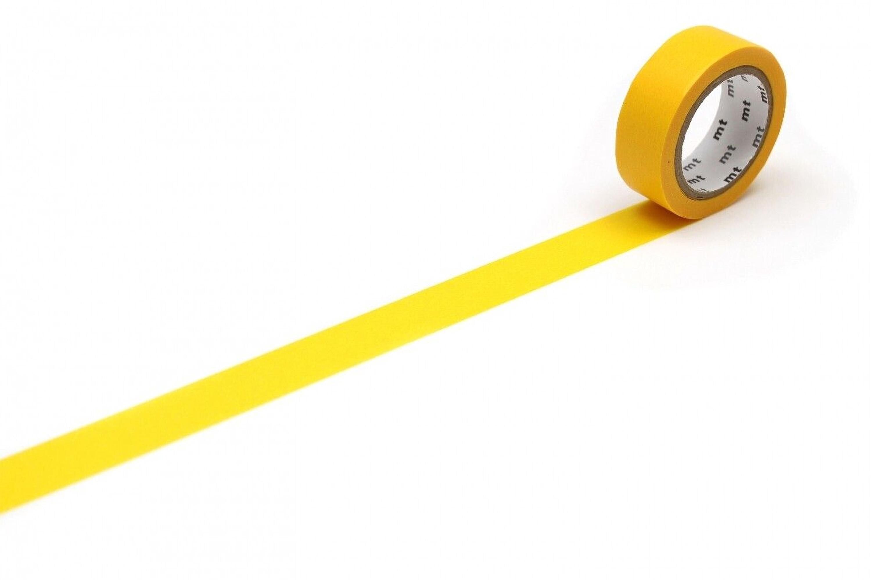 A yellow tape roll is lying on a white surface, with a single yellow line extending from the roll.