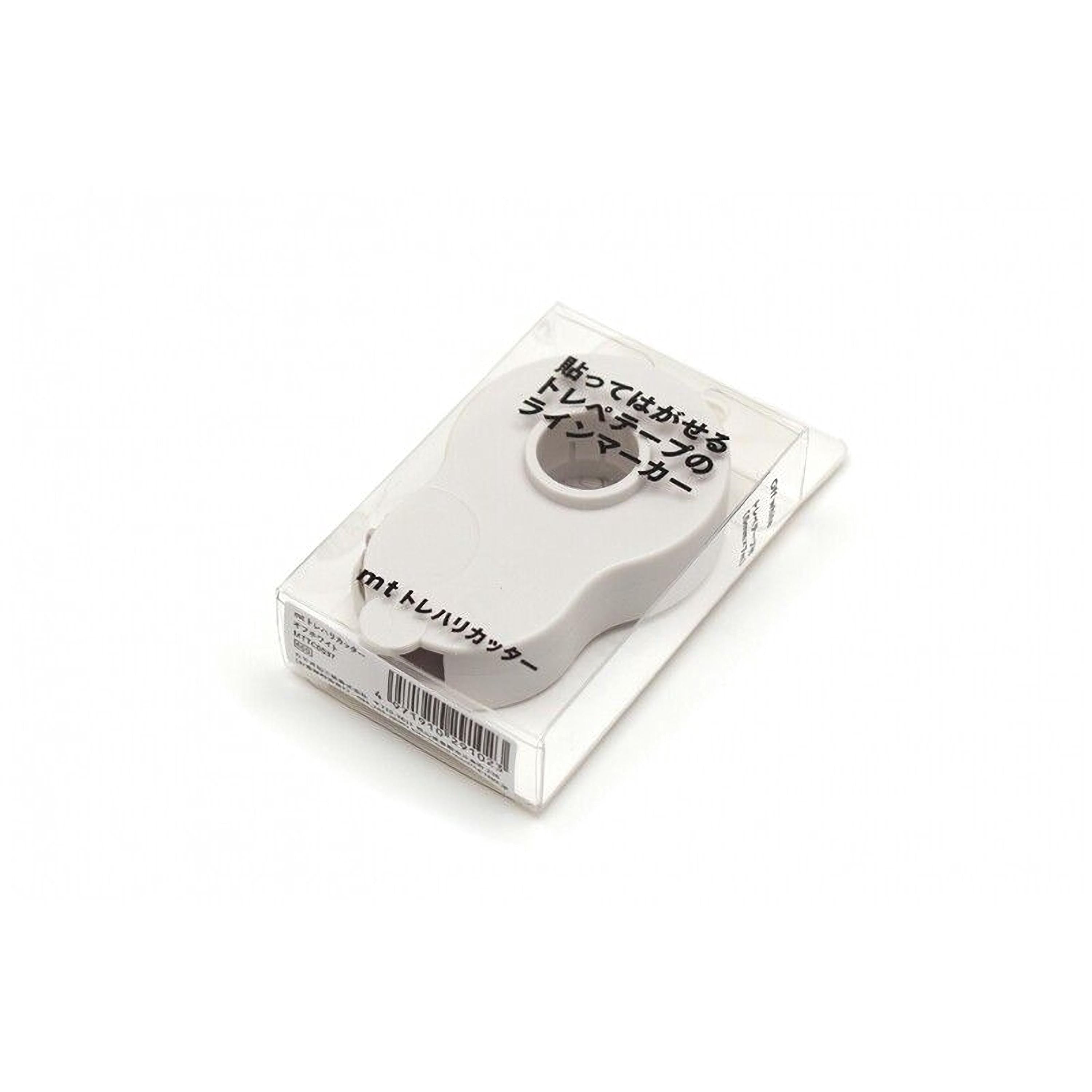 A white object with Japanese text on it, placed in a clear plastic box.