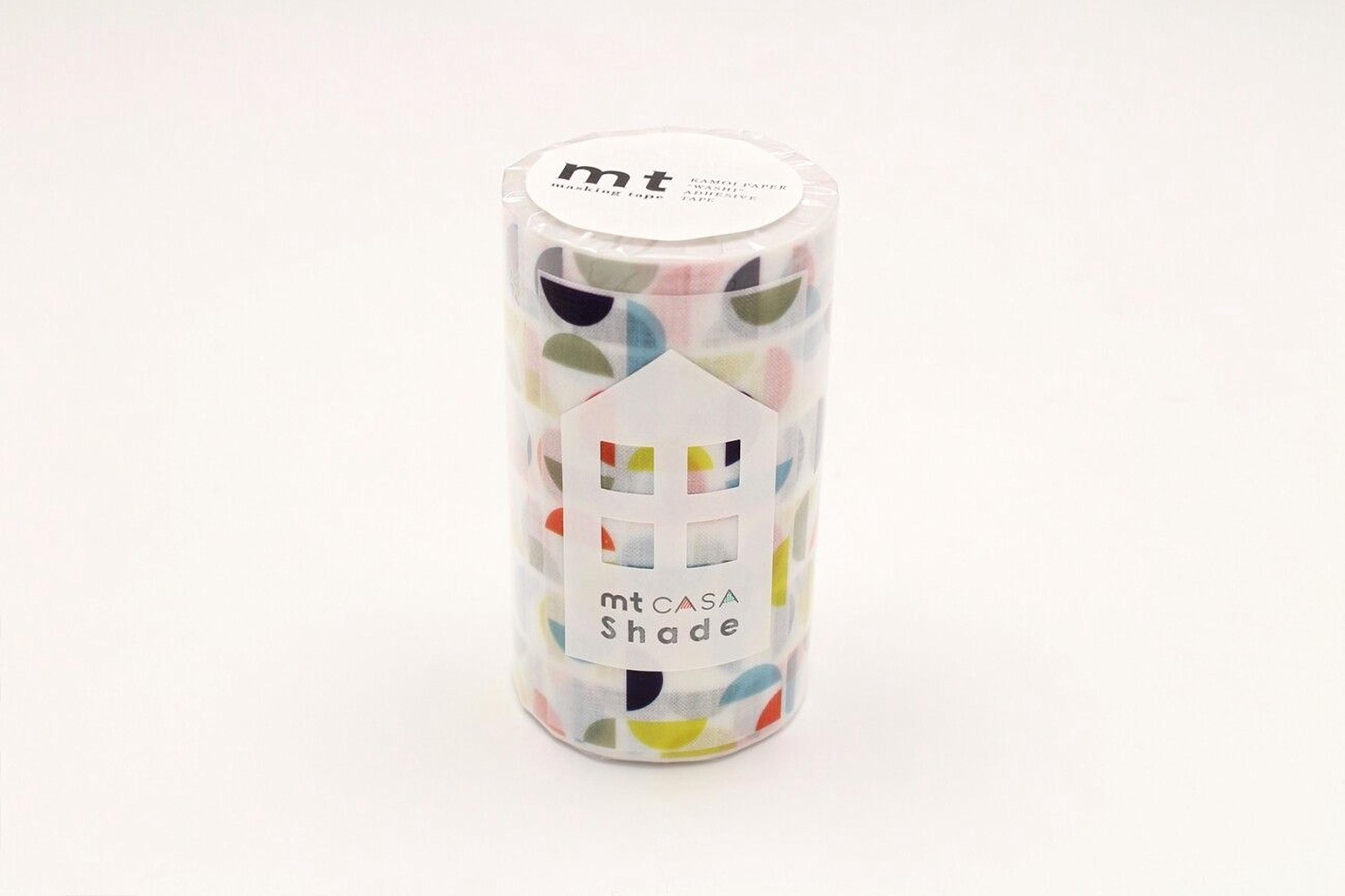 A cylindrical container with a pattern of colorful circles and a white label that reads "mt CASA Shade".