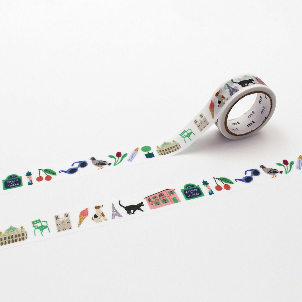A roll of colorful tape with various illustrations of buildings, animals, and objects printed on it, lying on a white background.