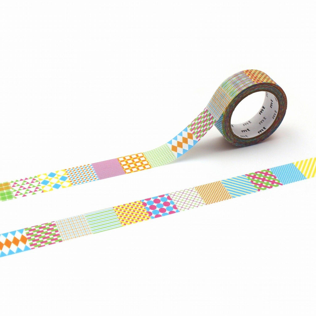a roll of colorful patterned tape with a variety of geometric shapes and designs, including squares, triangles, and circles, arranged in a visually appealing manner.