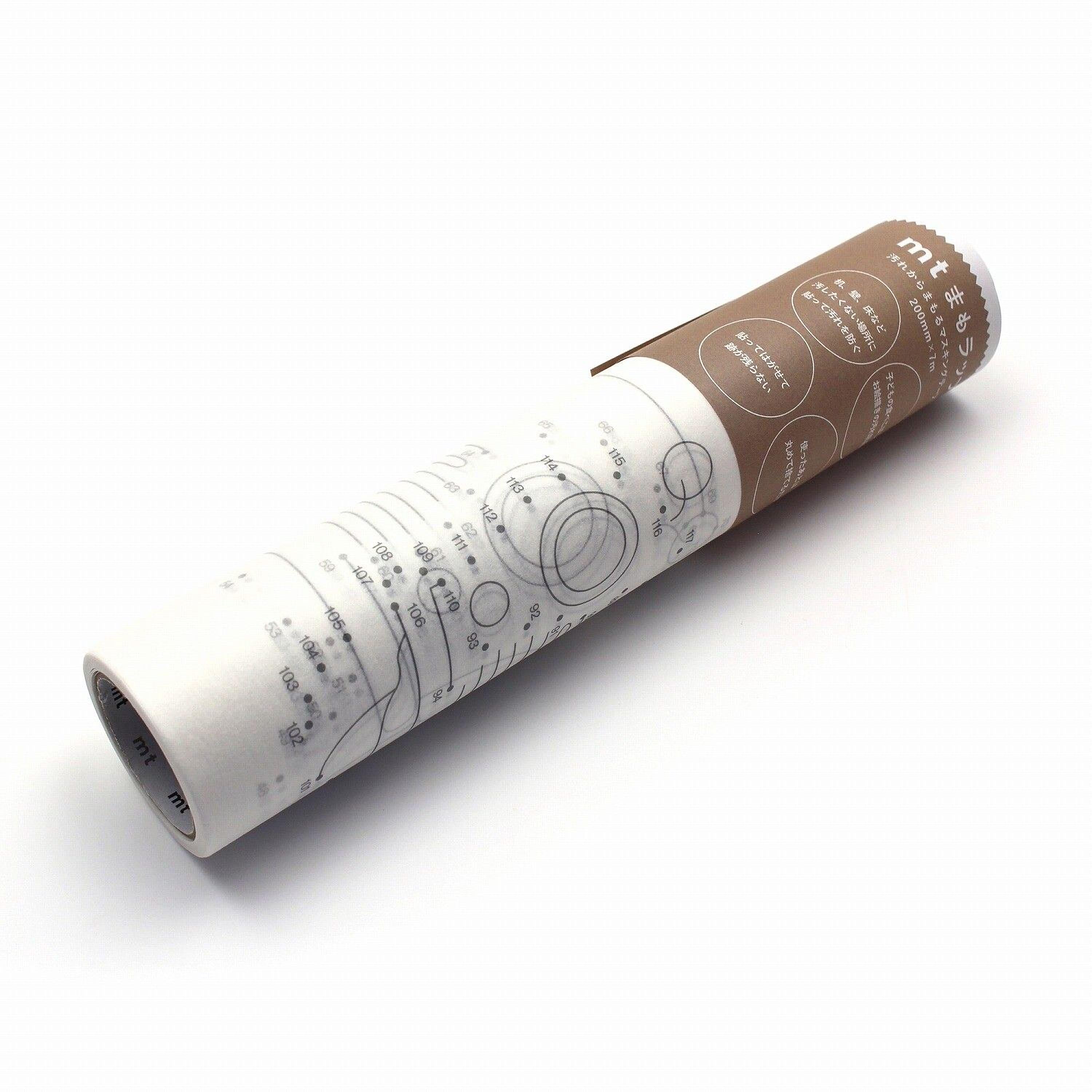 a cylindrical object with a white and brown color scheme, and it appears to be a roll of paper or a tube.