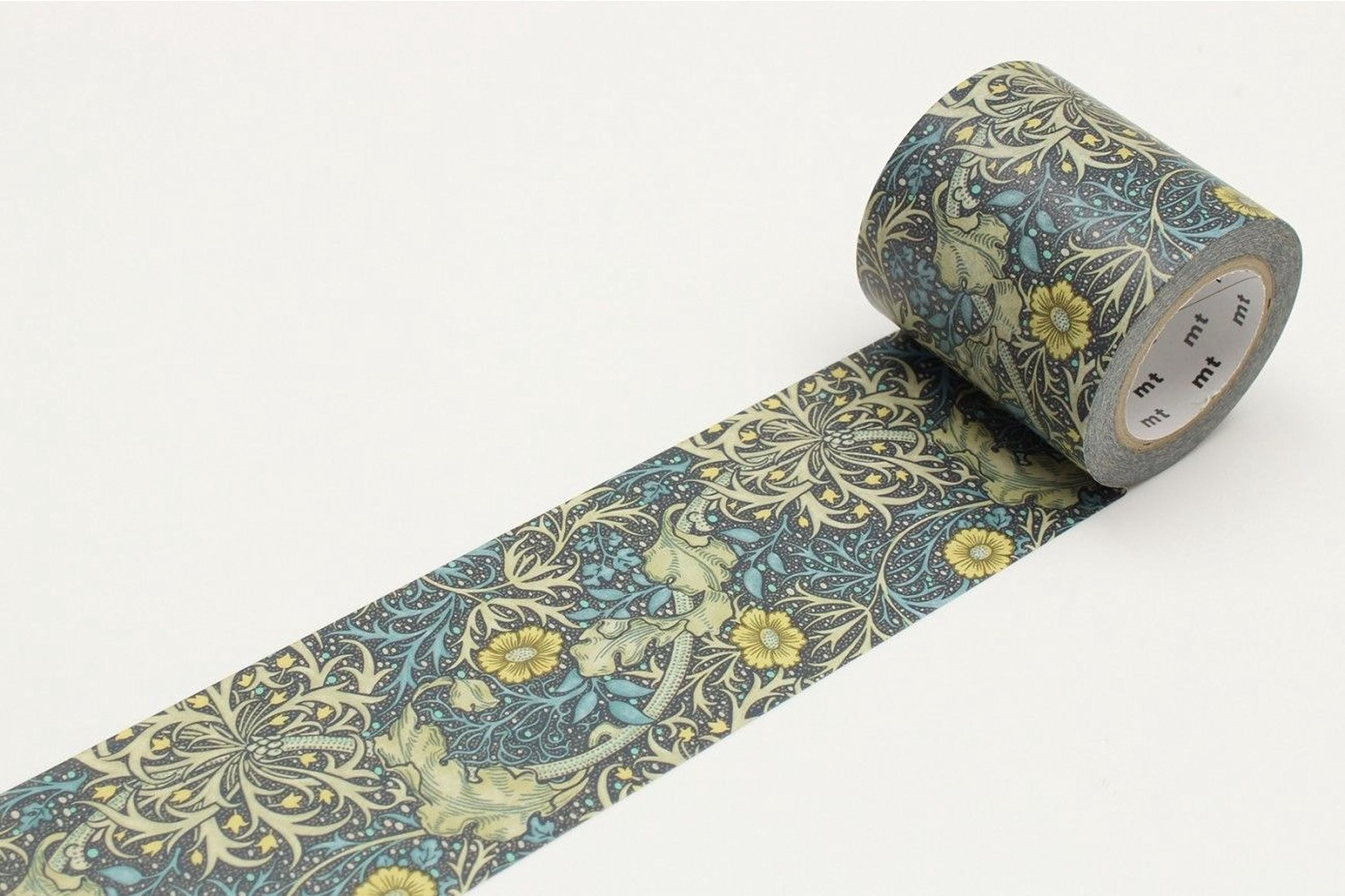 A roll of patterned tape with a floral design in shades of blue and yellow.