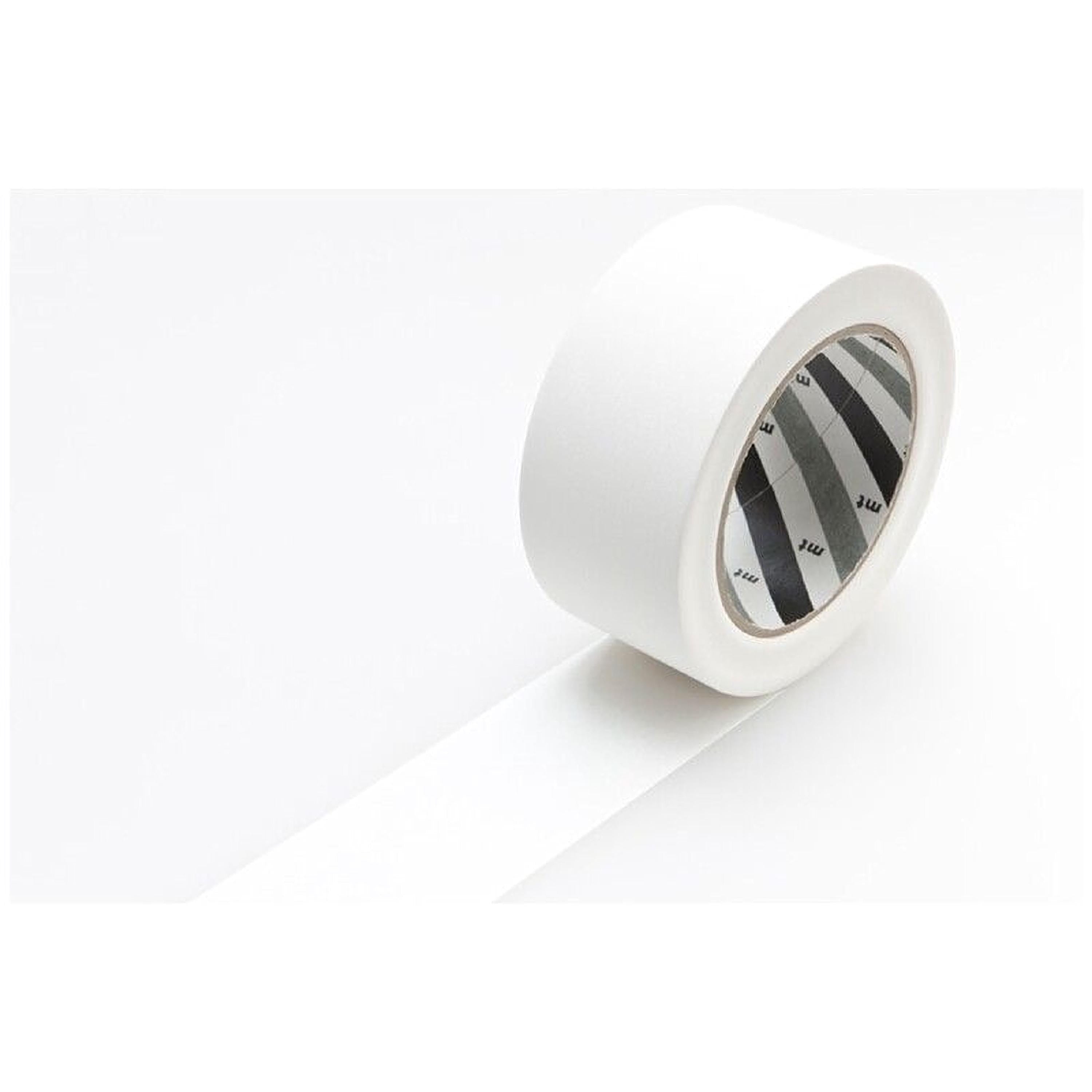 A roll of white tape with a black and white pattern on it, lying on a white surface.