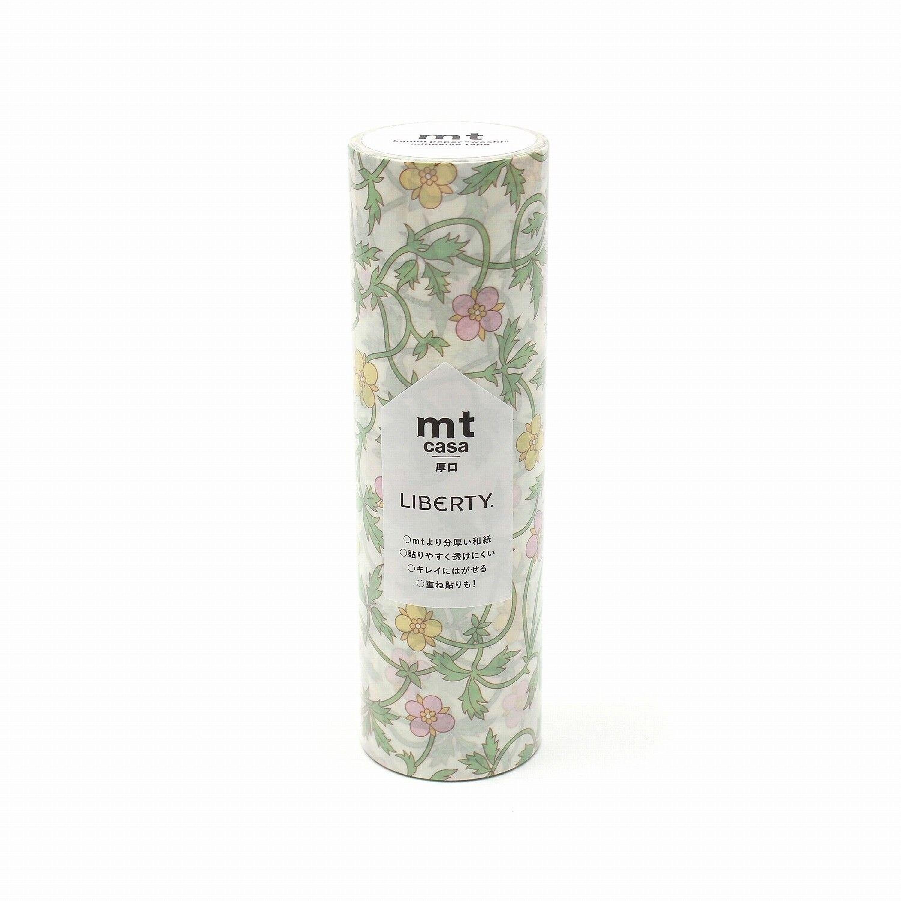A cylindrical container with a floral pattern and text printed on it.