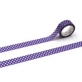 a roll of purple and white polka dot tape lying on a white background.