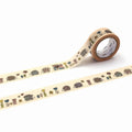 a roll of beige tape with a repeating pattern of hedgehog illustrations on it.