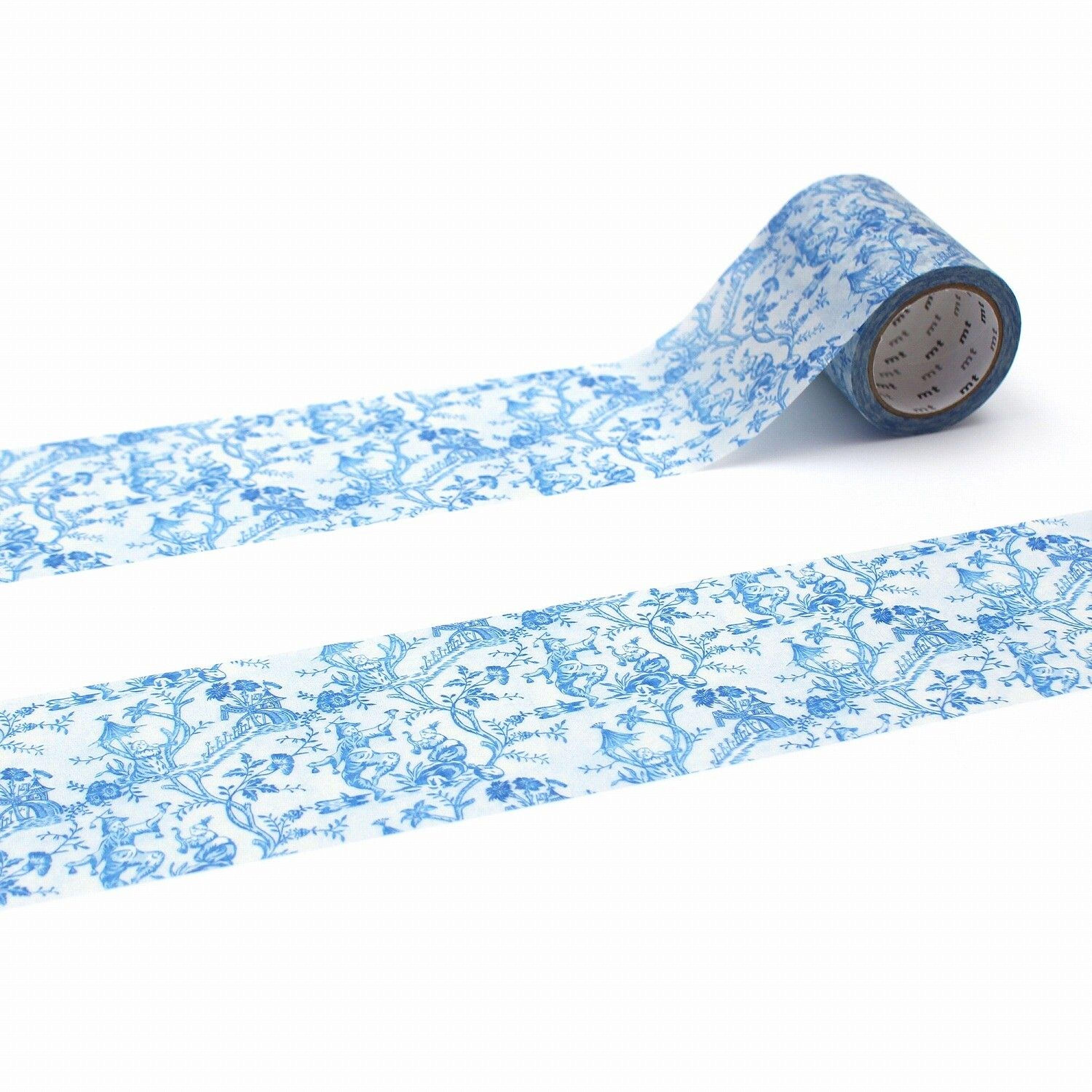 a roll of blue and white floral pattern tape on a white background.